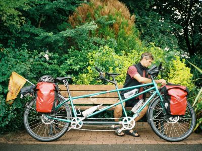 Xani Byrne with tandem bicycle. Link to Xani Byrne with tandem bicycle.