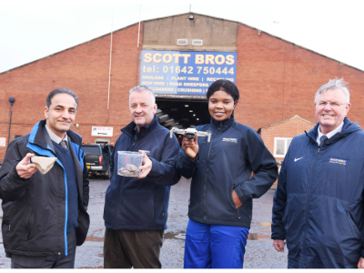 L-R) Dr Sina Rezaei Gomari, Associate Professor of Research; Peter Scott, Director, Scott Bros; Eghe Ikponmwosa-Eweka, KTP Associate; Bob Borthwick, Director, Scott Bros. Pictured holding clay to be used in the artificial soil as well as a drone that will be used in the monitoring of the test site.. Link to Supporting the development of a new carbon credit market.