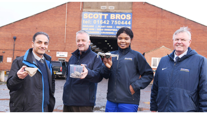 L-R) Dr Sina Rezaei Gomari, Associate Professor of Research; Peter Scott, Director, Scott Bros; Eghe Ikponmwosa-Eweka, KTP Associate; Bob Borthwick, Director, Scott Bros. Pictured holding clay to be used in the artificial soil as well as a drone that will be used in the monitoring of the test site.