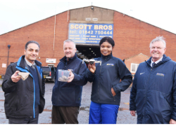 L-R) Dr Sina Rezaei Gomari, Associate Professor of Research; Peter Scott, Director, Scott Bros; Eghe Ikponmwosa-Eweka, KTP Associate; Bob Borthwick, Director, Scott Bros. Pictured holding clay to be used in the artificial soil as well as a drone that will be used in the monitoring of the test site.