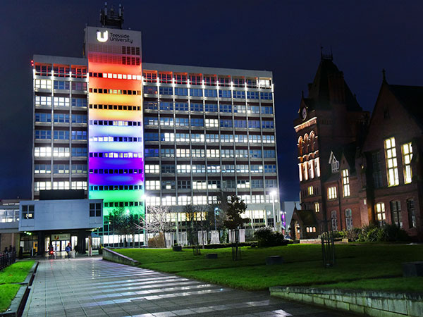 Teesside University building with disability pride colours