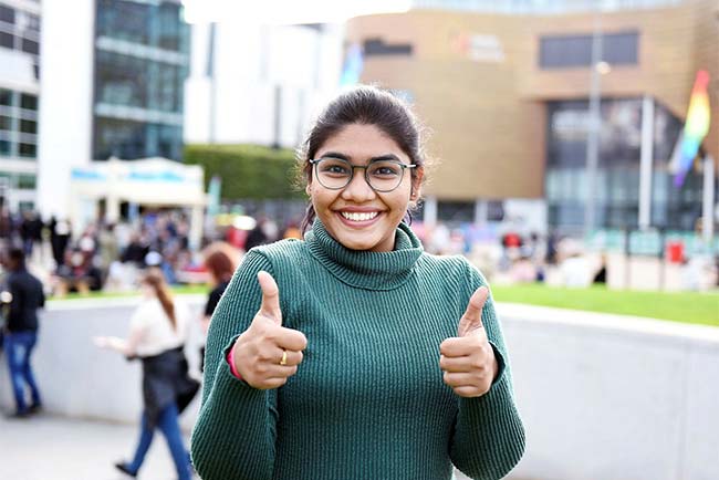 Happy student on campus